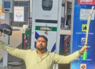 Indian man poses in cricket gear as petrol makes century