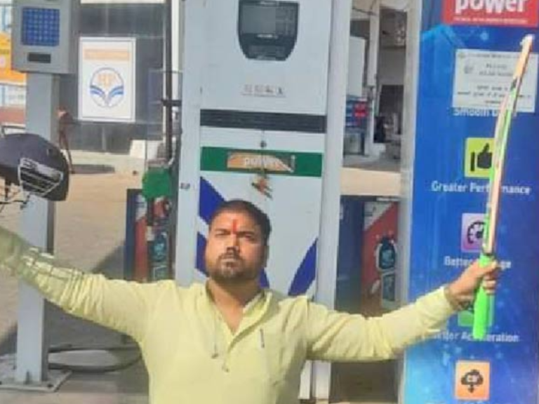 Indian man poses in cricket gear as petrol makes century