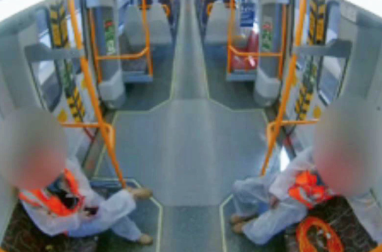 Two Brisbane train cleaners fired after CCTV catches them doing nothing