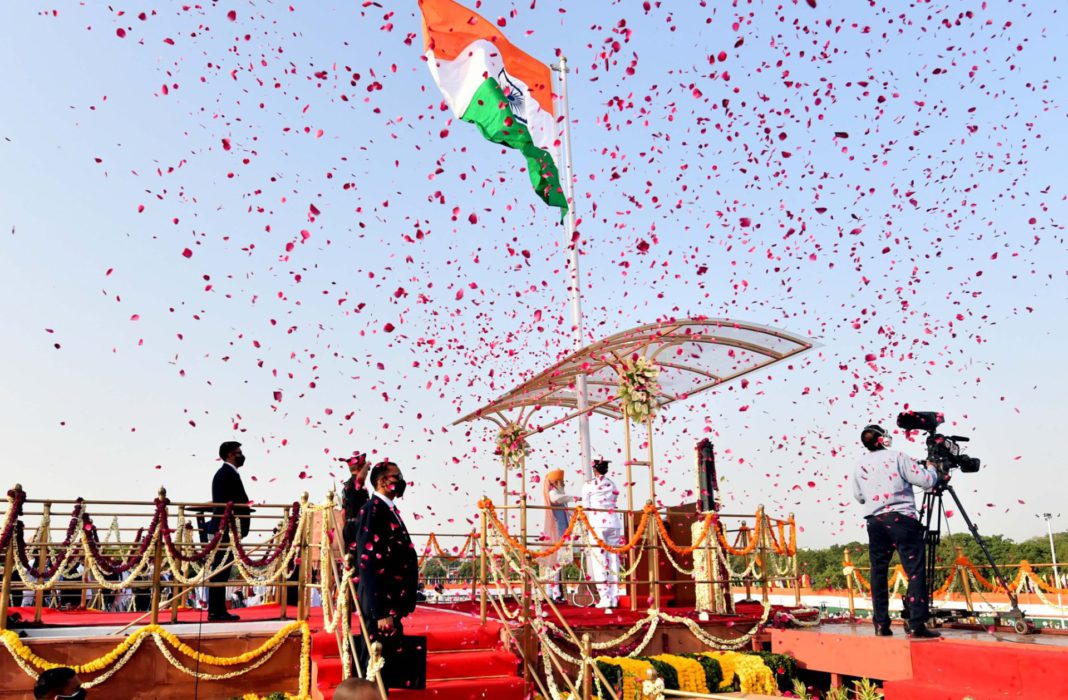 Indian PM Narendra Modi at Red fort unfurling Tricolour