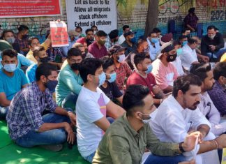 “We are migrants not virus. Allow us back”: Visa holders stage protest in India