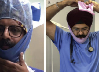 Discriminatory Rule: Sikh medical students forced to shave in order to pass the face mask fit test or defer the year in Victoria Image source: Elastic rubber band beard cover worn over turban and head cloth. "Under-mask beard cover (Singh Thattha technique) for donning respirator masks in COVID-19 patient care" 2020.