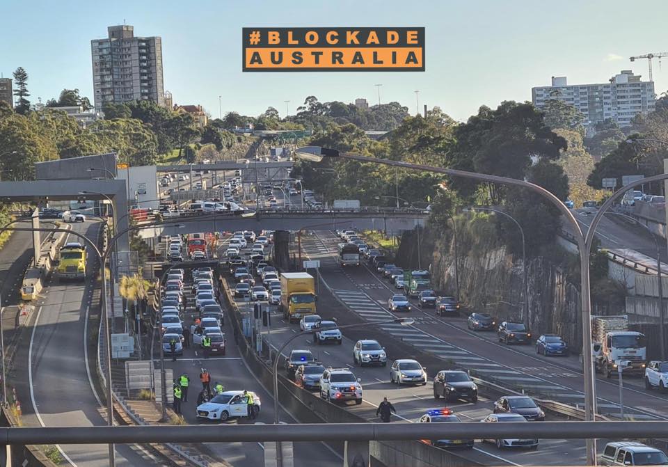 Climate protesters cause peak morning traffic chaos by blocking Sydney