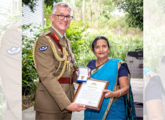 Chief of Army Lieutenant General Rick Burr, with 1st Division's Dr Madhu Patel, celebrating her 50 years of service in the Australian Army at Gallipoli Barracks in Brisbane, Queensland. Photo: Corporal Miguel Anonuevo (Twitter)