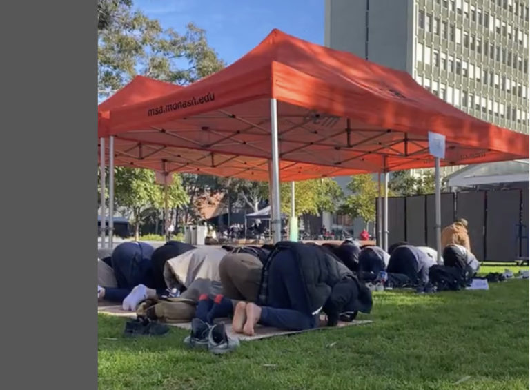 Muslim students offering Namaz on Monash University lawn say multi-faith room impractical
