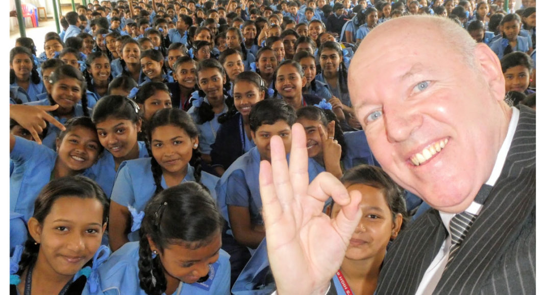 Jonathan Crabtree interacting with students in India (Image Source: Jonathan Crabtree)
