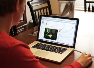 Student on computer (Wikimedia Commons)