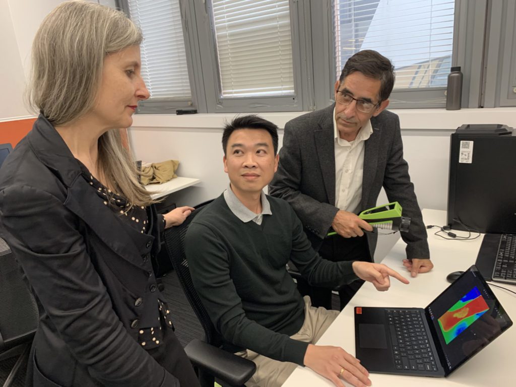 Dr Rajna Ogrin, Dr Quoc Cuong Ngo and Professor Dinesh Kumar (left to right) holding a standard thermal imaging device, similar to what was used as part of the research. Image Credit: RMIT University