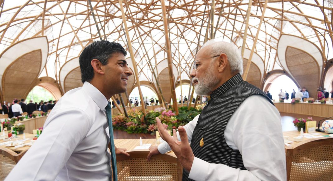 Indian PM Narendra Modi and British Pm Rishi Sunak at G20 meeting; Image Source: @PIB