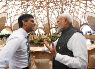 Indian PM Narendra Modi and British Pm Rishi Sunak at G20 meeting; Image Source: @PIB