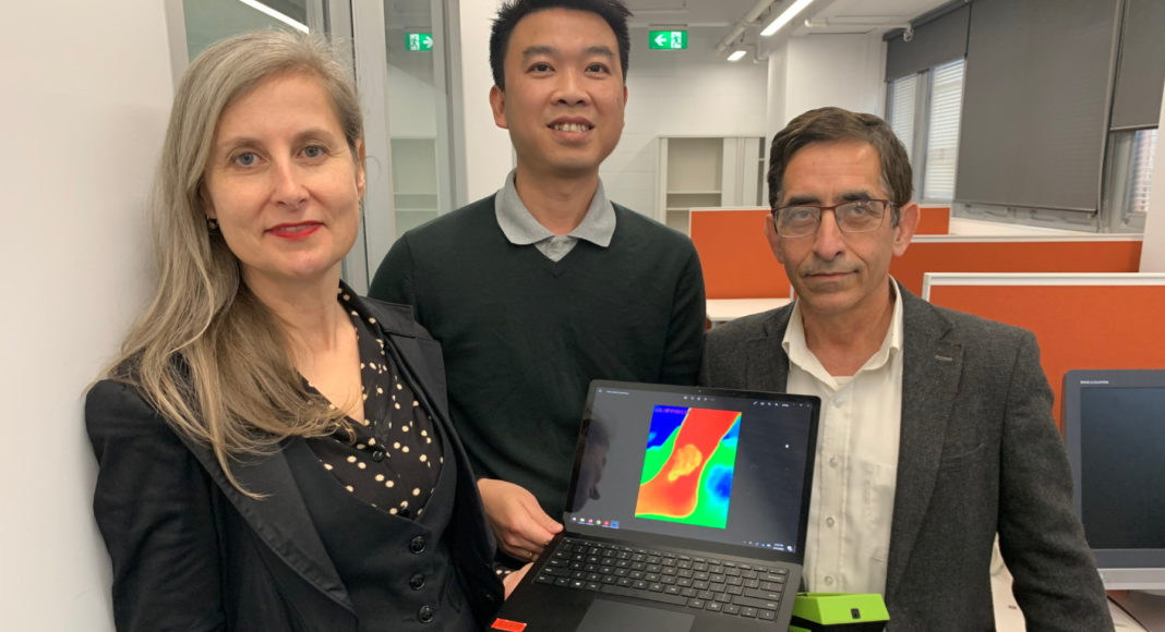 Dr Rajna Ogrin, Dr Quoc Cuong Ngo and Professor Dinesh Kumar (left to right) holding a standard thermal imaging device, similar to what was used as part of the research. Image Credit: RMIT University