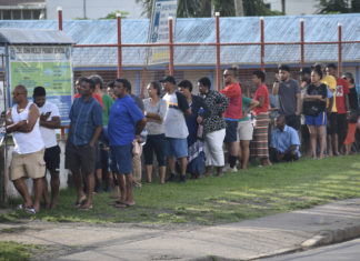 Voters line up outside John Wesley Primary School along Grantham Road in Raiwaqa before 7.30am to cast their vote as polling officially opened today for Fiji’s 2022 General Election. Picture: GERALDINE PANAPASA