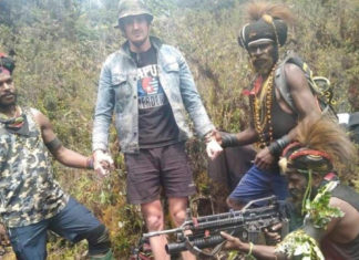 Abducted New Zealand pilot appears in photos with armed West Papua rebels Papuan separatist rebels with their hostage at an undisclosed location in Papua province. Picture: West Papua Liberation Army