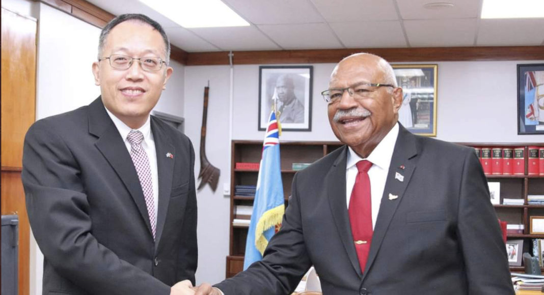 Fiji PM Sitiveni Rabuka with Chargé d'Affaires (CDA) ad interim Mr. Wang Xuguang of the Embassy of the People’s Republic of China; Image Source: Supplied
