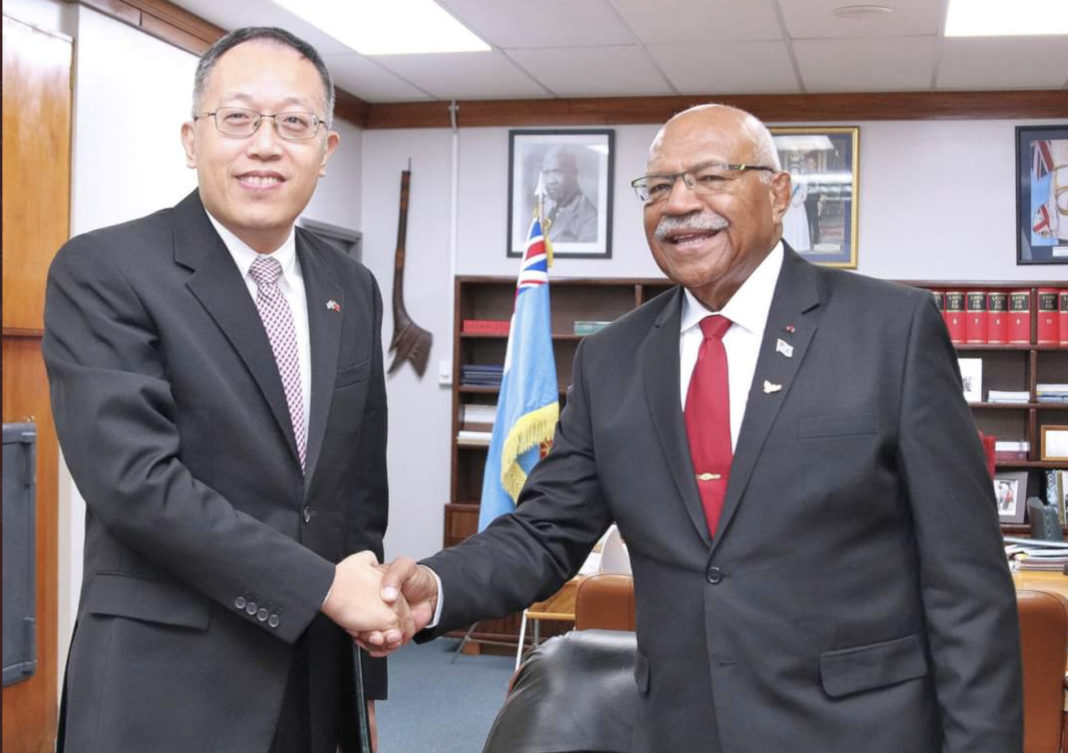 Fiji PM Sitiveni Rabuka with Chargé d'Affaires (CDA) ad interim Mr. Wang Xuguang of the Embassy of the People’s Republic of China; Image Source: Supplied