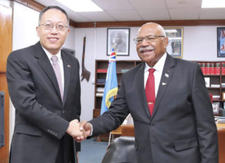 Fiji PM Sitiveni Rabuka with Chargé d'Affaires (CDA) ad interim Mr. Wang Xuguang of the Embassy of the People’s Republic of China; Image Source: Supplied