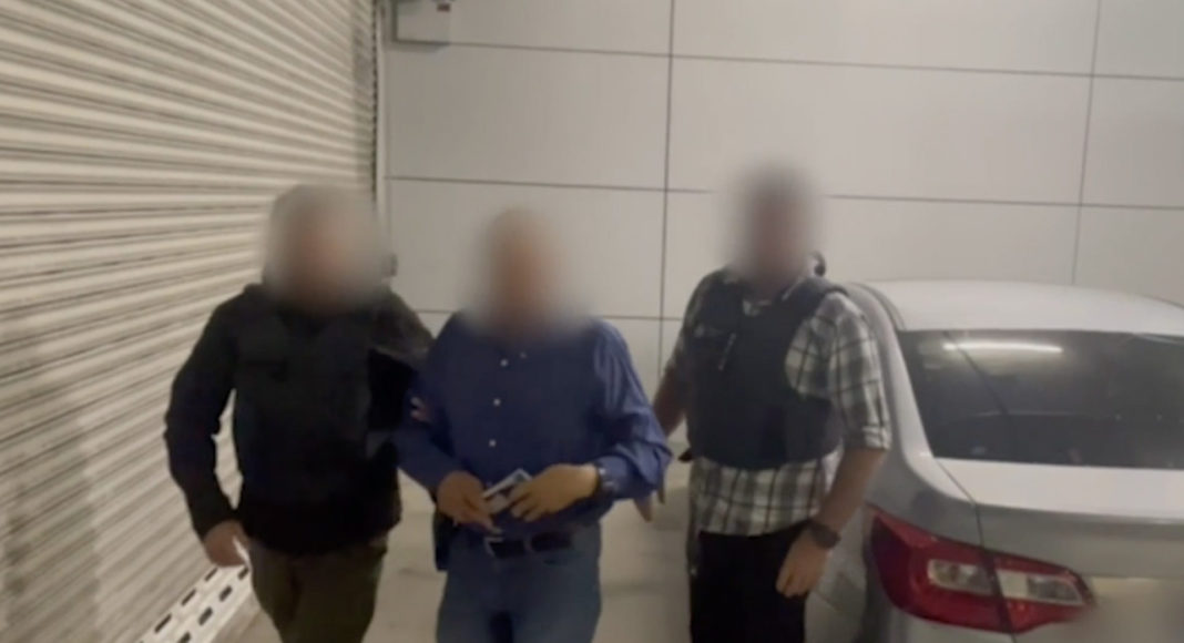 AFP arrests a man; Image Source: The Australia Today AFP arrests a man; Image Source: The Australia Today