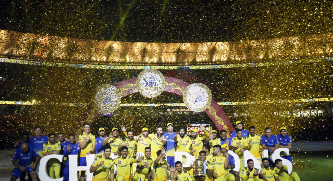 Chennai Super Kings players celebrate with the trophy after winning final match of IPL 2023