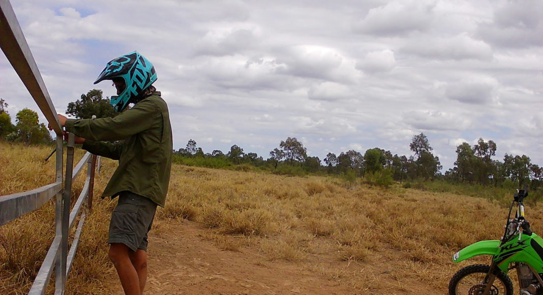 The activist allegedly damaging the stock gates; Image Source: Supplied