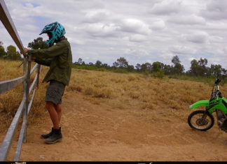 Activist charged over alleged sabotage of central Queensland cattle operation The activist allegedly damaging the stock gates; Image Source: Supplied