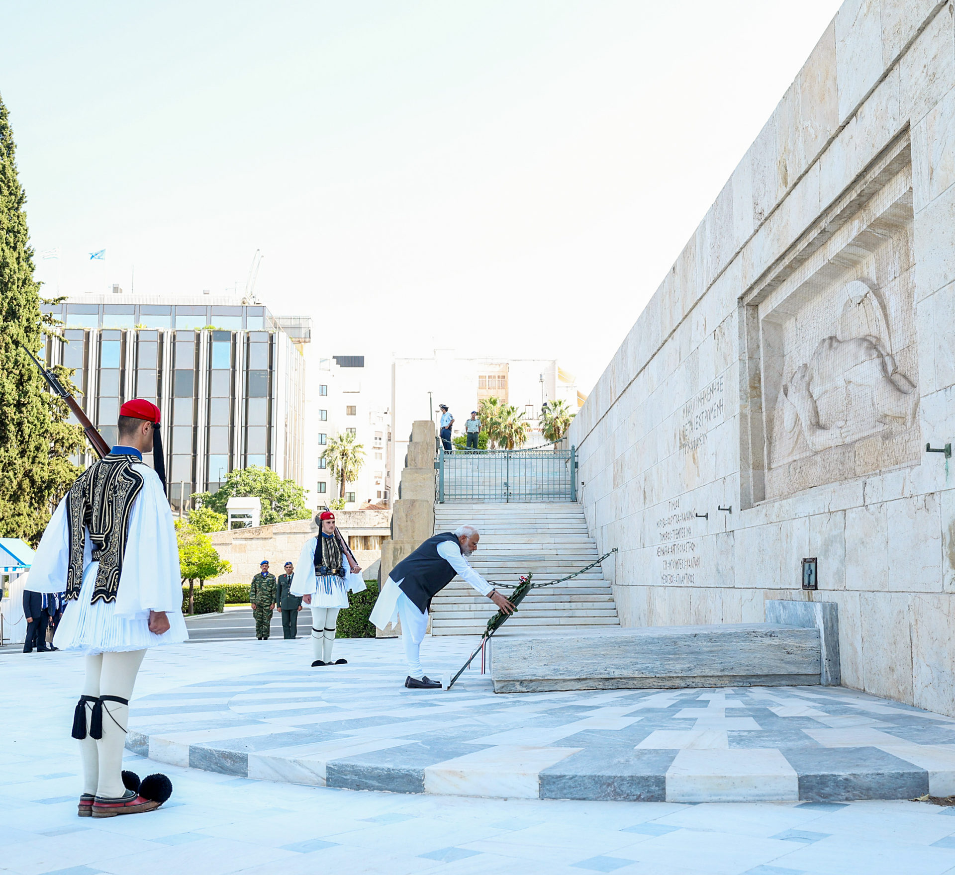 Indian Prime Minister Narendra Modi lays a wreath at the Tomb of Unknown Soldier in Athens on Friday.
