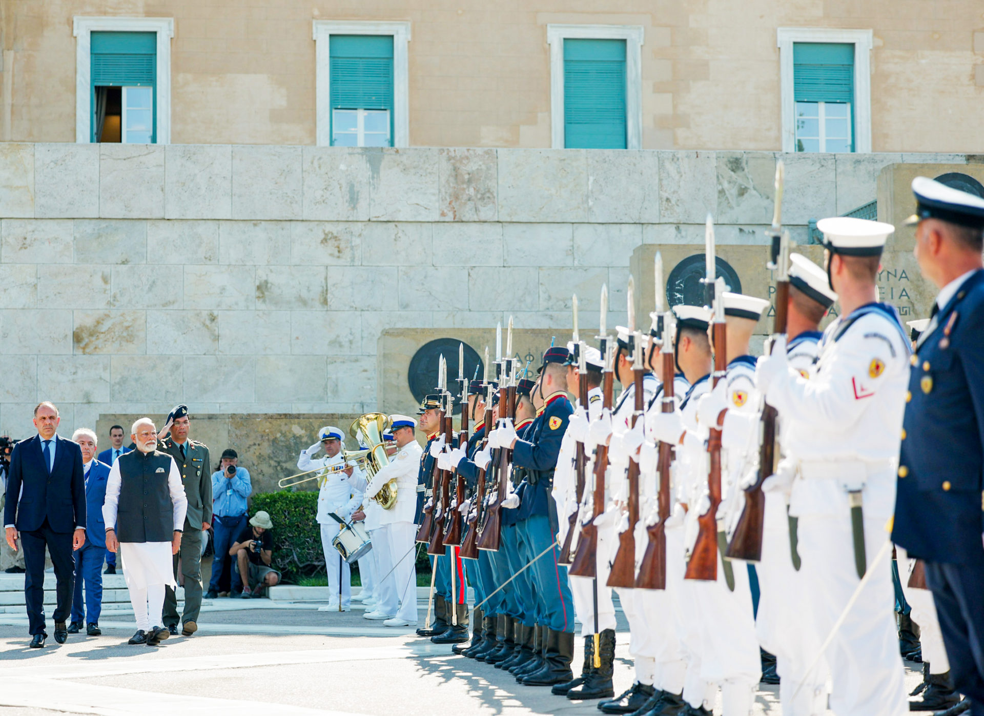 Indian Prime Minister Narendra Modi being accorded a Ceremonial Guard of Honour on his arrival in Athens on Friday. Greece's Minister of Foreign Affairs George Gerapetritis also present.