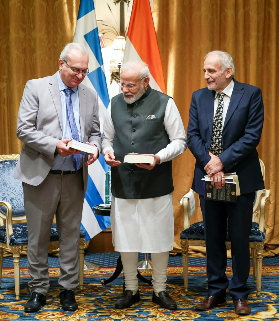 Indian Prime Minister Narendra Modi during an interaction with Professor Dimitrios Vassiliadis and Dr. Apostolos Michailidis