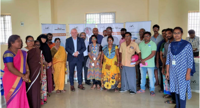 Shadow Minister Jason Wood distributes eye glasses for beneficiaries in India