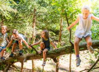 Children playing outdoor; Image Source; @CANVA