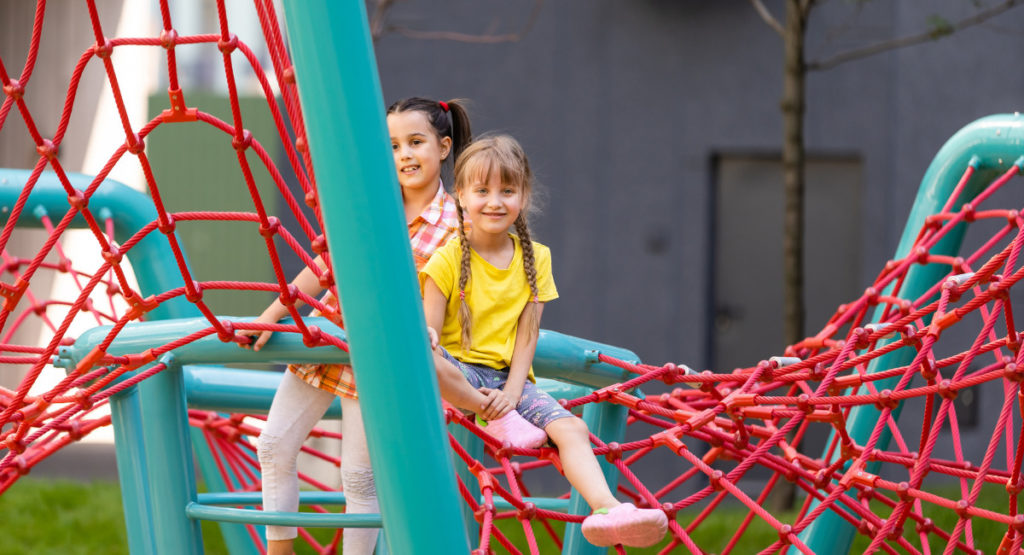 Children playing outdoor; Image Source; @CANVA