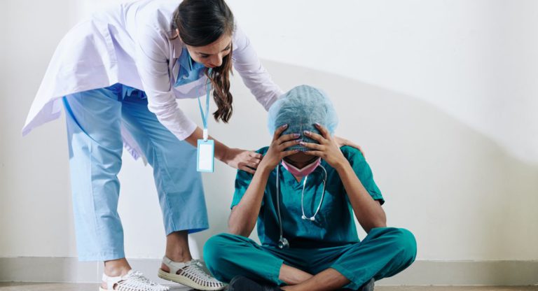 Why do only a third of assaulted nurses report it to the police?
