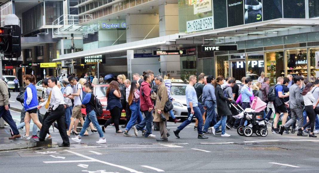 People crossing the road ; Image Source @CANVA