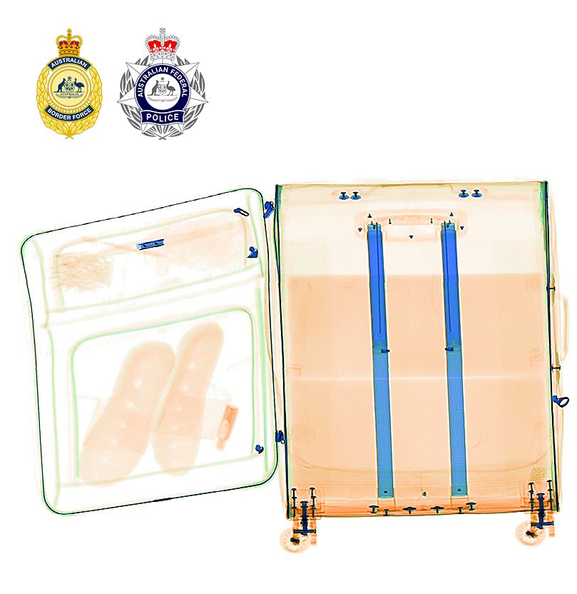United States national charged for allegedly importing 2kg cocaine into Melbourne 2 X ray photo of luggage 2