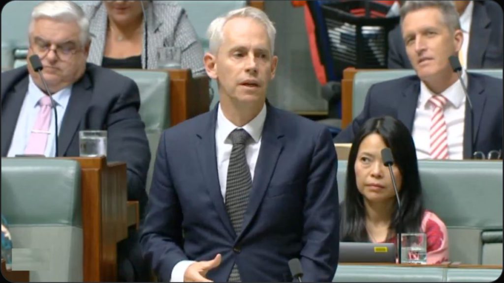 Minister Andrew Giles at Parliament of Australia; Image Source @Screenshot