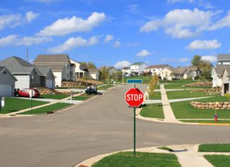 If you’ve got a dark roof, you’re spending almost $700 extra per year to keep your house cool Suburban roof tops; Image Source: @Canva