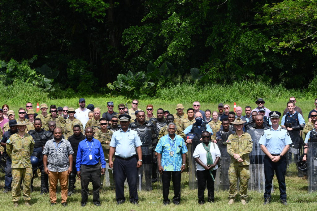 Public Order Management exercise attendees alongside senior members of the SIAF 1
