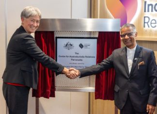 Penny Wong, Minister for Foreign Affairs unveils a plaque at the opening of the Centre for Australia-Indian Relations (CAIR) office in Parramatta on Monday 20th February 2024. In attendance are Indian High Commissioner to Australia, Gopal Baglay