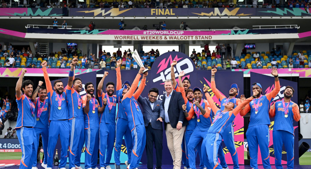 Barbados, Jun 30 (ANI): India's players celebrate with the trophy after beating South Africa by 7 runs in the ICC Mens T20 World Cup 2024 final match, at Kensington Oval in Barbados on Saturday. (ANI Photo)