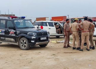 Hathras, July 02 (ANI): Police personnel at the spot after around 50-60 people killed in a tragic incident of a stampede at 'Satsang' (religious event) that occurred in Hathras on Tuesday. (ANI Photo)