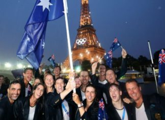 Australia’s Olympic team soaked wet but still best dressed at Paris opening ceremony