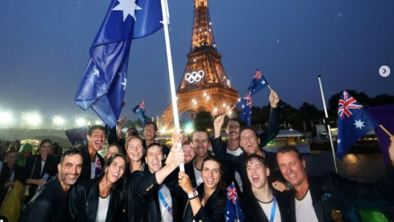 Australia’s Olympic team soaked wet but still best dressed at Paris opening ceremony