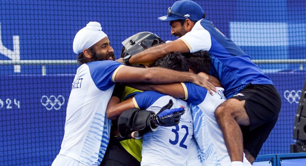 Paris, Aug 04 (ANI): India's players celebrate after winning the men’s quarterfinal hockey match against Great Britain, in the Paris Olympic 2024, at Yves Du Manoir Stadium in Paris on Sunday. India defeats Great Britain 4-2 in the shootout. (ANI Photo/Hockey India- X)