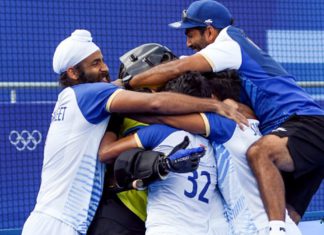 Paris, Aug 04 (ANI): India's players celebrate after winning the men’s quarterfinal hockey match against Great Britain, in the Paris Olympic 2024, at Yves Du Manoir Stadium in Paris on Sunday. India defeats Great Britain 4-2 in the shootout. (ANI Photo/Hockey India- X)