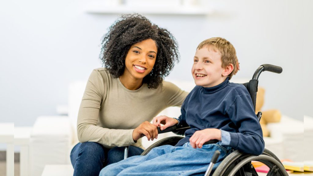 Disabled Person and Carer Image Source CANVA 3