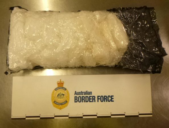 Two men charged, 16kg of drugs and over $10,000 in illicit cash seized 2 meth from the intercepted package 2