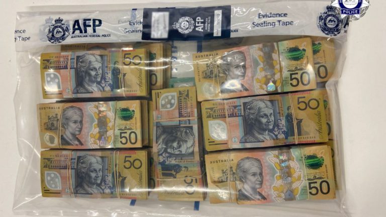 41-year-old woman arrested with nearly $145,000 in illicit cash taped under her dress
