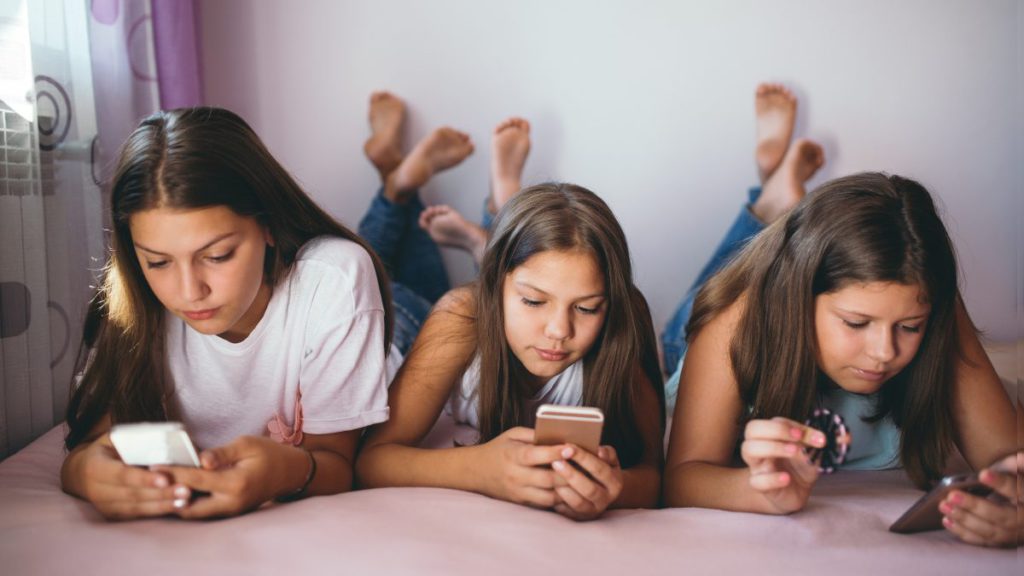 Young Girls on Social Media; Image Source- CANVA