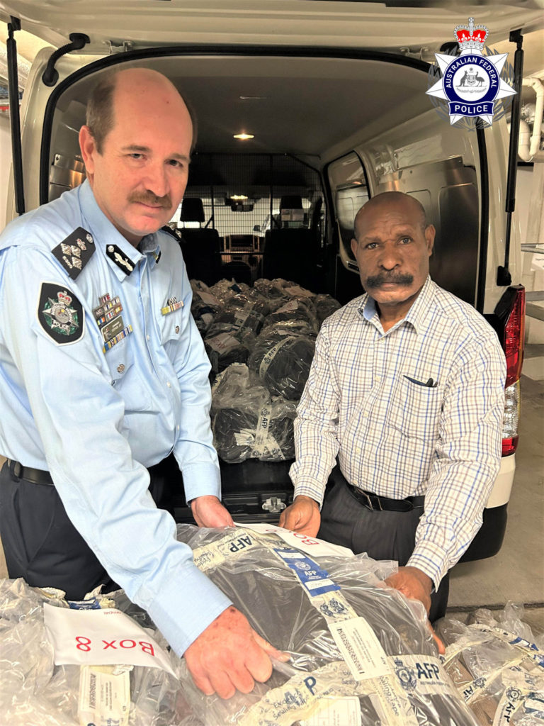 Cmdr Stephen Jay and Deputy Commissioner Donald Yamasombi 44