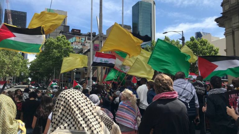 Melbourne man charged for displaying Hizballah flag during protest