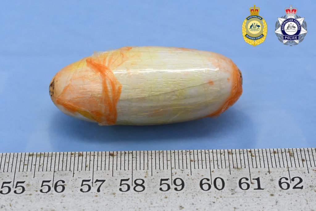Two men caught smuggling heroin in their stomachs at Perth Airport 2 Close up of 10 gram pellets 2
